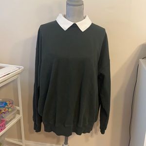 Green sweatshirt with white detailed collar
